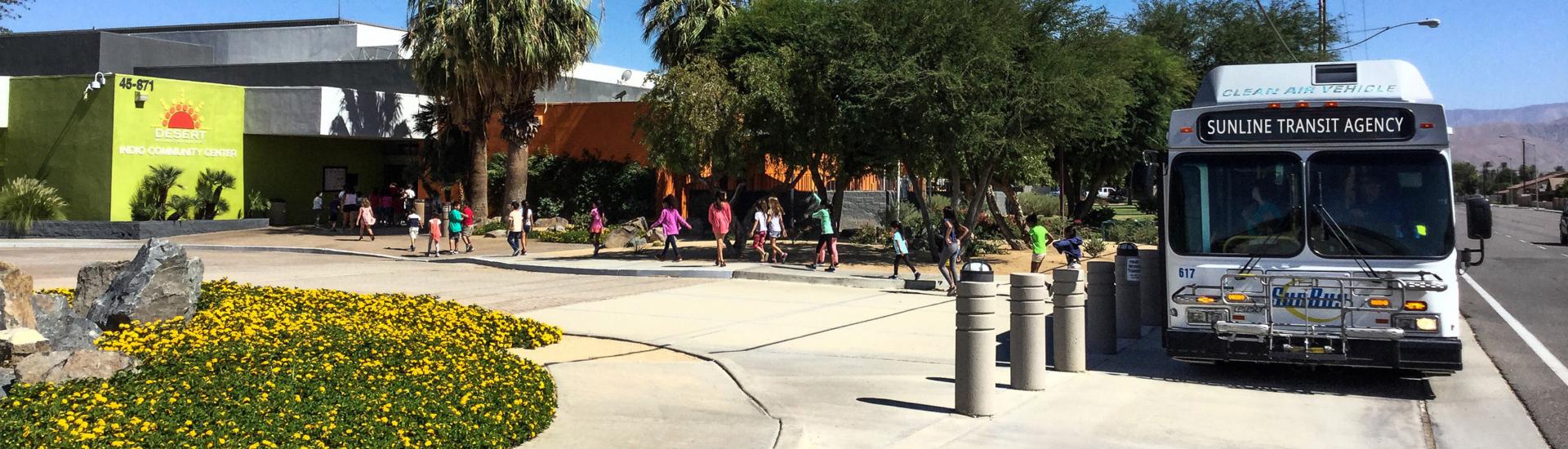 SunLine Bus with students at local community center